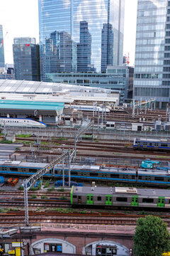 Shinkansen and commuter trains at the main railway train station in Tokyo, Japan