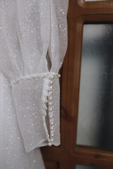 sleeve of white bridesmaid dress