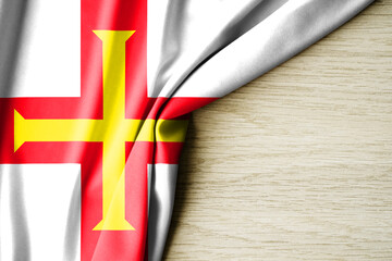 Guernsey flag. Fabric pattern flag of Cuba. 3d illustration. with back space for text. Close-up view.