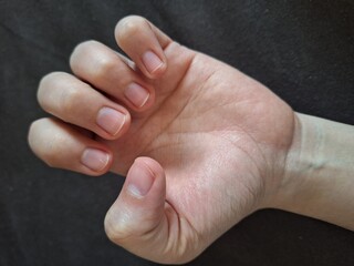 Fingers. Nails in close-up