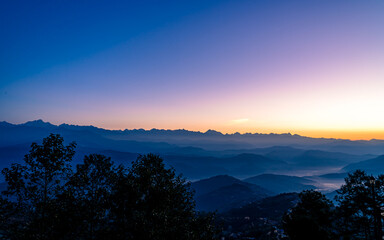 gloomy sunrise over mountains in Nepal.