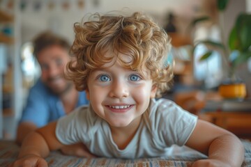 A candid shot of a child with curly hair deeply engaged at a table, with a homely background