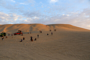 Fototapeta na wymiar people walking in the desert