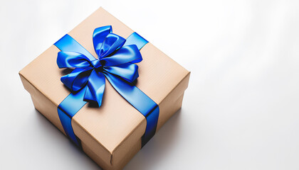 Obraz premium Gift box with blue bow on white background. International Women's Day celebration