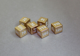 Golden dice with numbers. Game dice.	
