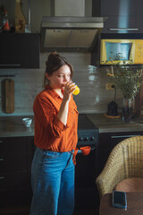 Portrait of a beautiful woman with a glass of orange juice.