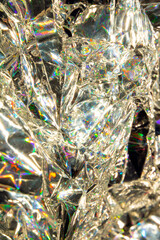 Fototapeta premium Holographic Crumpled Gold Bronze Paper Material which is Shiny for Background