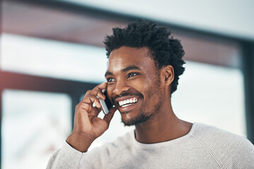 Happy, black man and laughing with phone call for funny joke, conversation or humor at office. Young African or male person with smile on mobile smartphone for comedy, friendly discussion or fun chat