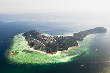A beautiful island surrounded by blue crystal clear water
