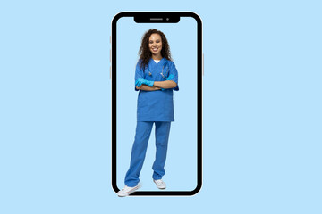 Young nurse in frame of phone on blue background