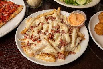 French fries with bacon and cheese