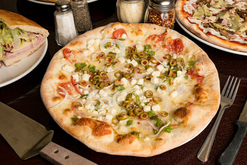 White pizza with green olives
