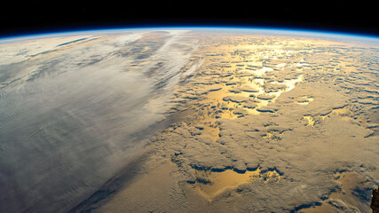 Sunlight reflection on Planet Earth. Digital enhancement of an image by NASA