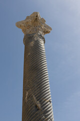 Ancient Corinthian Column Skyward. Close-up of a Corinthian column at the Kourion archaeological...