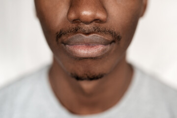 Closeup of the lower half of an African man's face