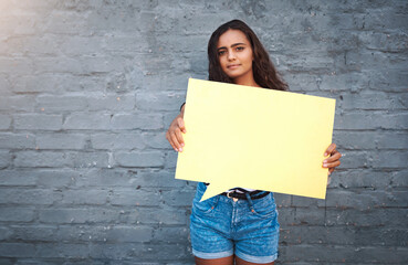 Brick, wall and girl with speech bubble, smile and opinion for promotion, marketing and...