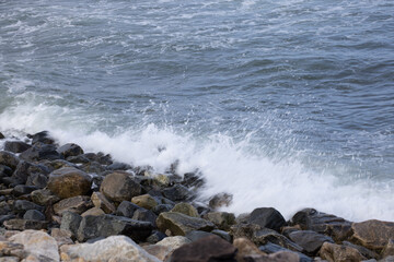 Ocean waves splashing on a rocky shore