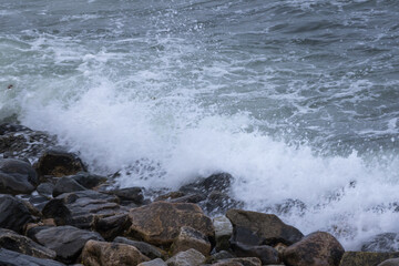 Ocean waves splashing on a rocky shore