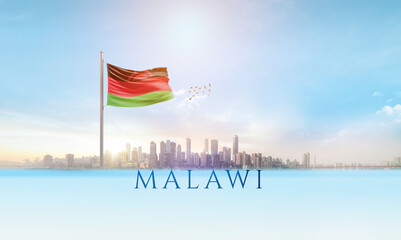 Malawi national flag waving in beautiful building skyline.