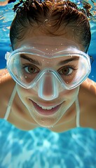 Fototapeta premium Exploring the depths young woman diving into crystal clear blue ocean on an underwater adventure