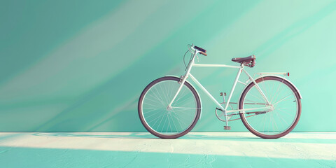 Fototapeta premium A white bicycle on turquoise background, 