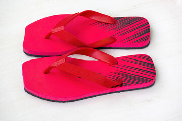 A pair of red flip-flops