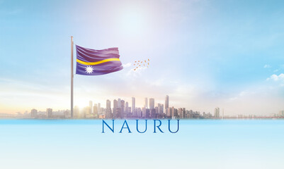Nauru national flag waving in beautiful building skyline.