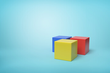 Three colorful geometric blocks isolated