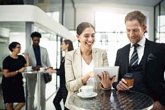 Business people, networking and discussion with coffee at event, tablet and share ideas at conference. Tea, technology or happy man and woman discussing, chat and break for collaboration at seminar