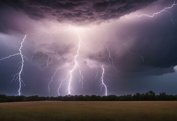 a large cloud of lightning is shown above a field.
