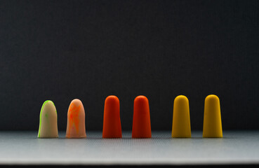 Sets of earplugs different colors and shapes