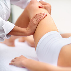 Woman, spa and leg massage for physiotherapy, health and physical therapy for wellbeing break....