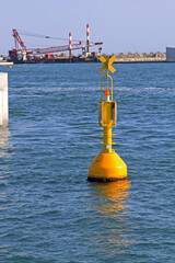 Yellow Special Mark Navigational Buoy at Canal in Venetian Lagoon