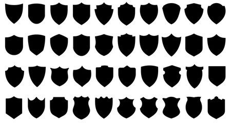 Shield icons set. Black shields of different shapes in flat graphic design. Vector illustration
