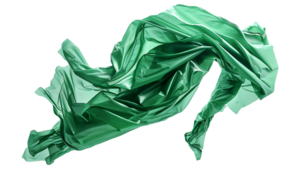 A crumpled piece of green fabric is floating in the air.