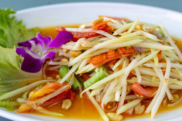 Thai papaya salad with fresh vegetables