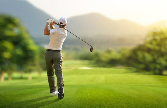 Golfer hit sweeping driver after hitting golf ball down the fairway.