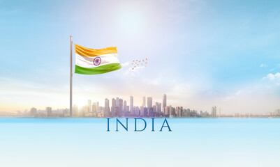 India national flag waving in beautiful building skyline.