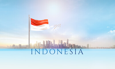 Indonesia national flag waving in beautiful building skyline.