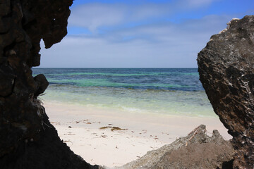 Seascape and beaches, Sandy Cape near Jurien Bay and Green Head, Western Australia, framed by cave...