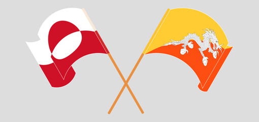 Crossed and waving flags of Greenland and Bhutan