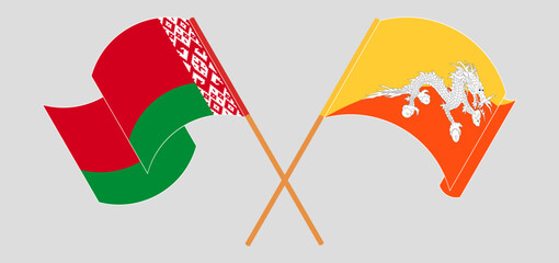 Crossed and waving flags of Belarus and Bhutan