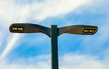 Streetlights LED light illumination with blue sky in Mexico.