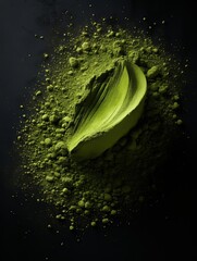 An artistic composition of matcha powder spilled from a tin, forming a natural, organic shape on a dark stone surface, emphasizing the powders fine quality