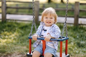 little child on swing