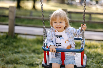 little child on swing