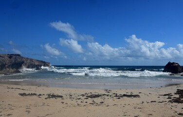 Fototapeta na wymiar Waves Rolling Ashore at Andicuri Beach in Aruba