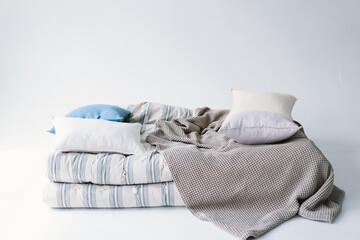 Pillows and mattress on a white background. Assortment for sleep