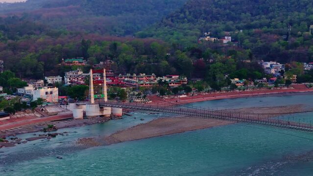 drone shot of lakshman jhula bridge in rishikesh