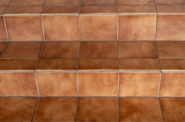 Background Closeup of Brown Ceramic Tile Stairs.